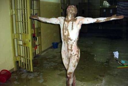 An Abu Ghraib prisoner smeared with feces.